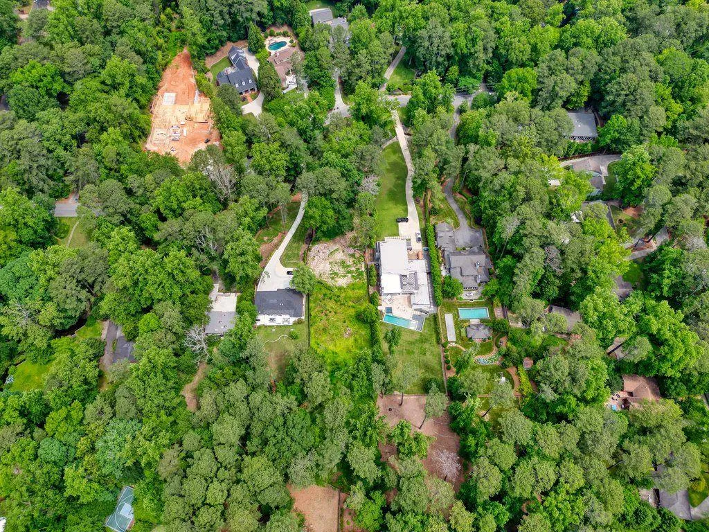 See the expansive multi million dollar estates the neighbors' have built on same-sized lots with pools, gardens, garages, and guest houses.