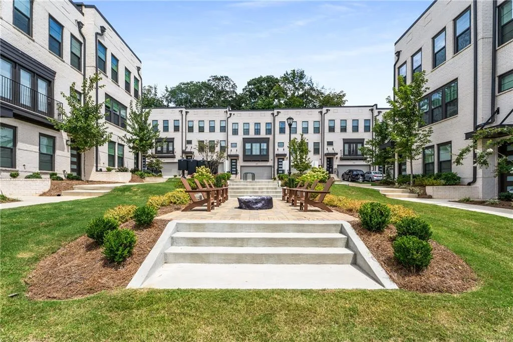 Surrounding community featuring a yard and a patio