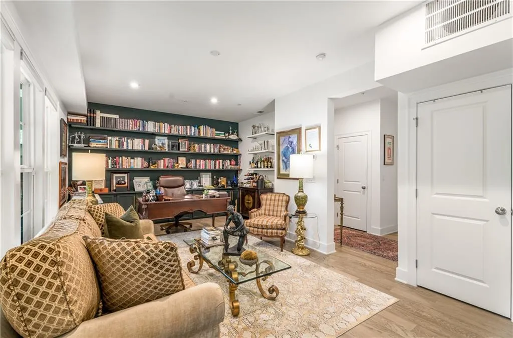 Sitting room featuring an office area, light wood-type flooring, and recessed lighting