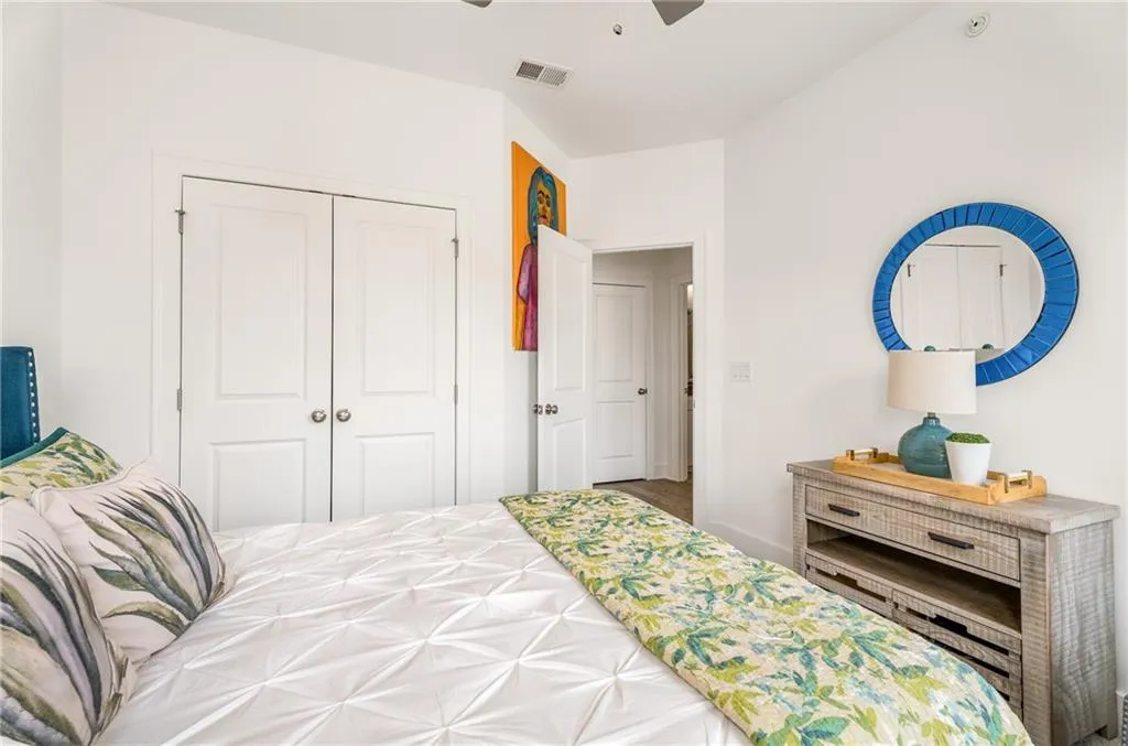 Bedroom with a closet and ceiling fan
