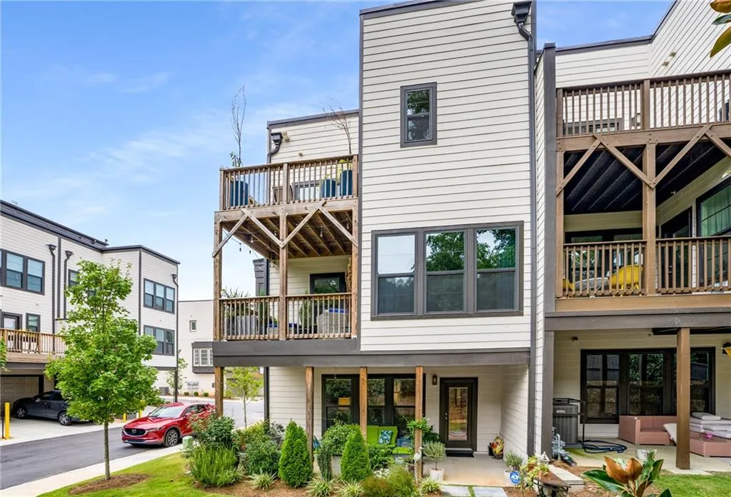 Back of property with a patio