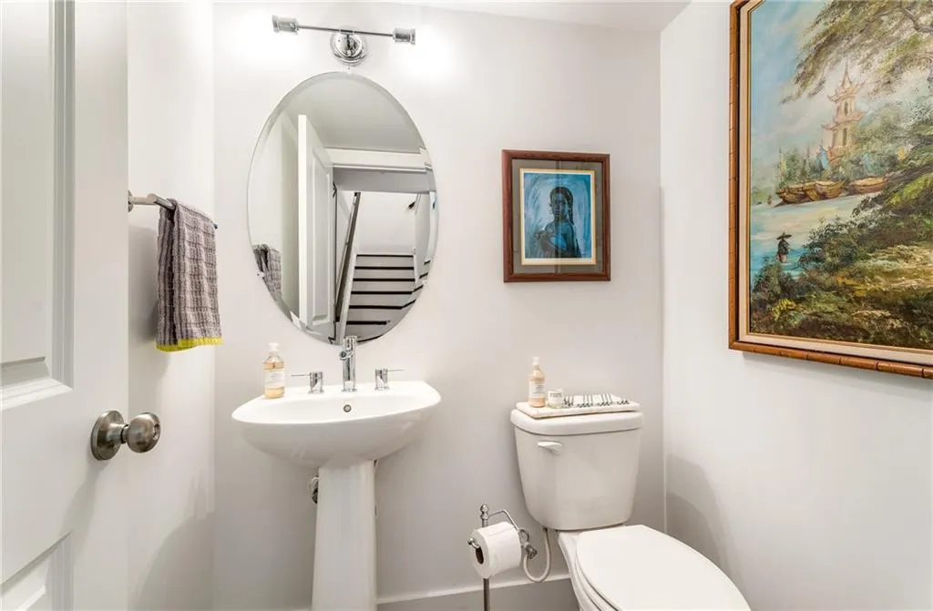 Half bath featuring toilet