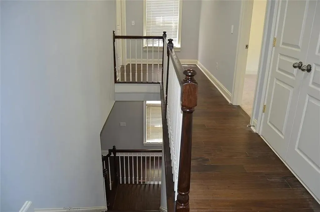 Stairway with wood finished floors