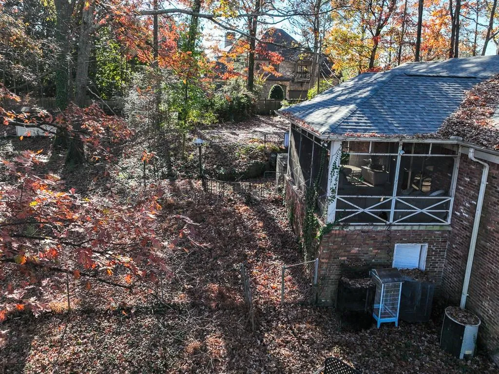 View of home's exterior featuring a sunroom