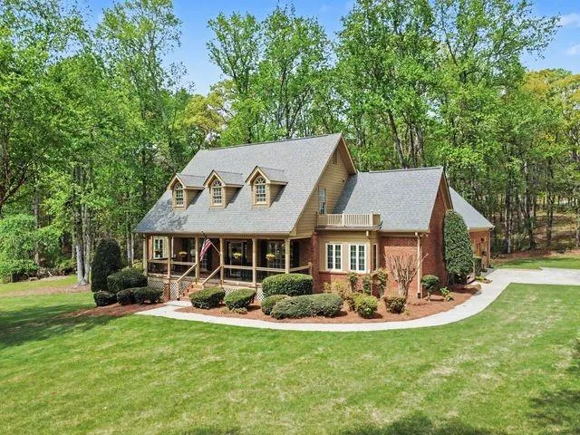 Front of home with large yard