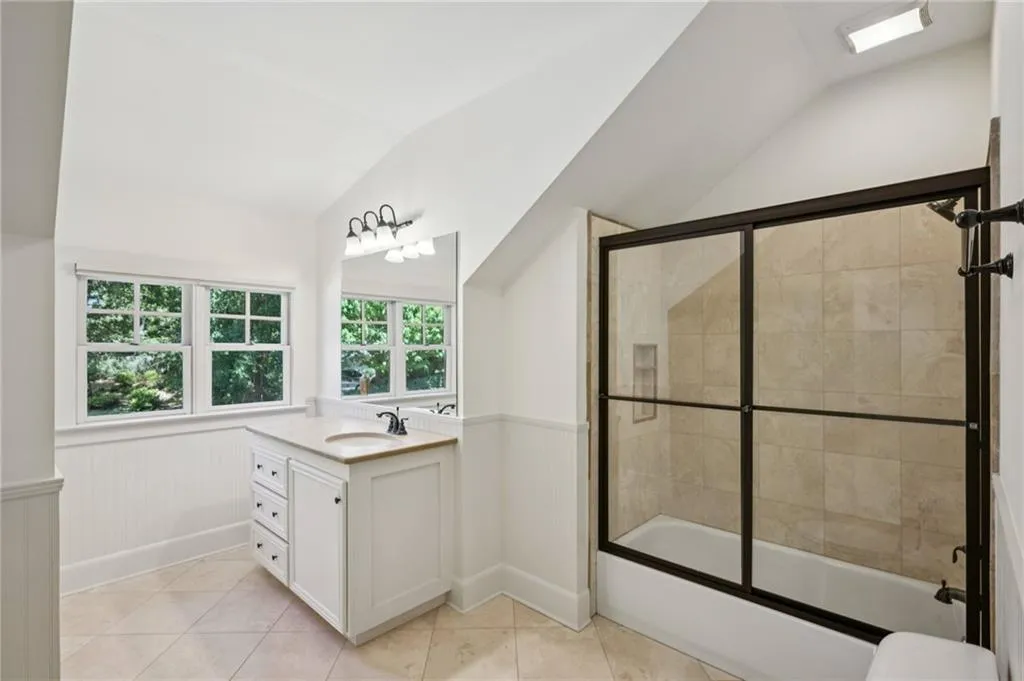 En suite baths for both upstairs bedrooms.