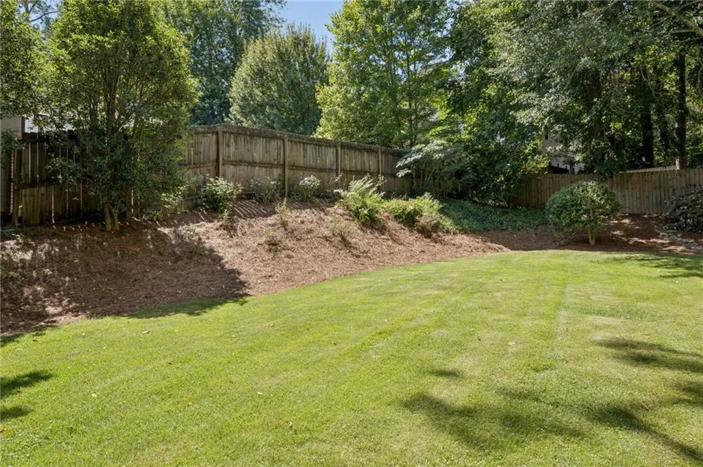 Level manicured yard.
