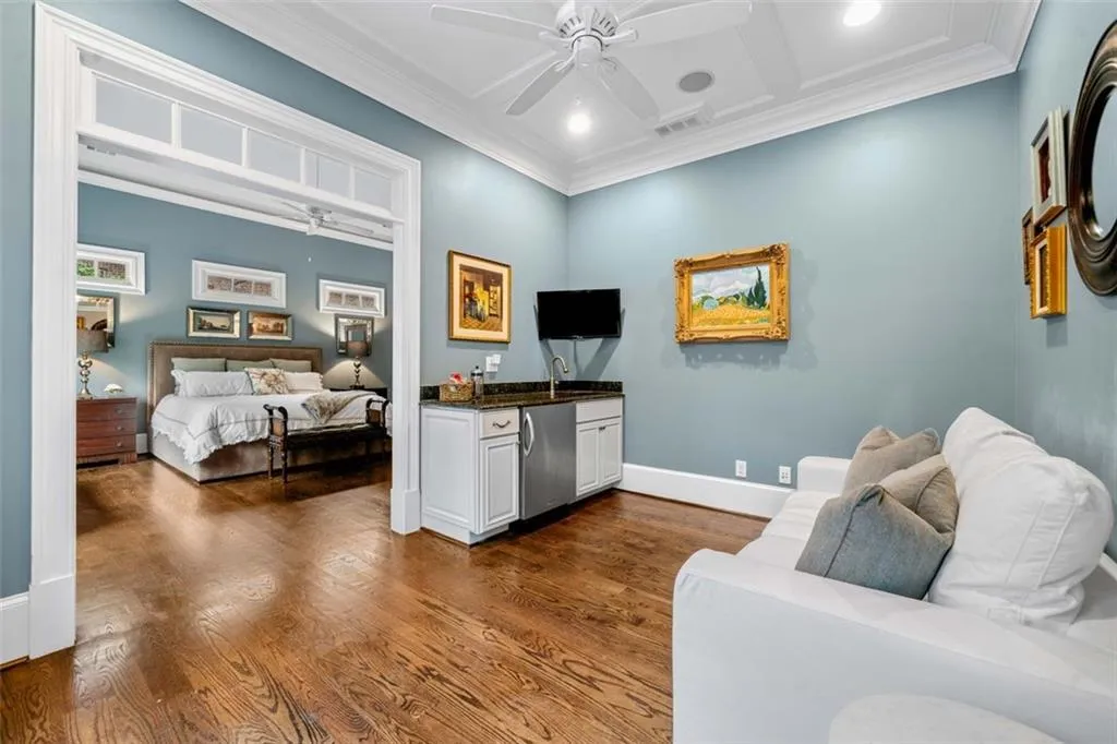 Sitting Room in Primary Suite with Beverage Fridge and Sink