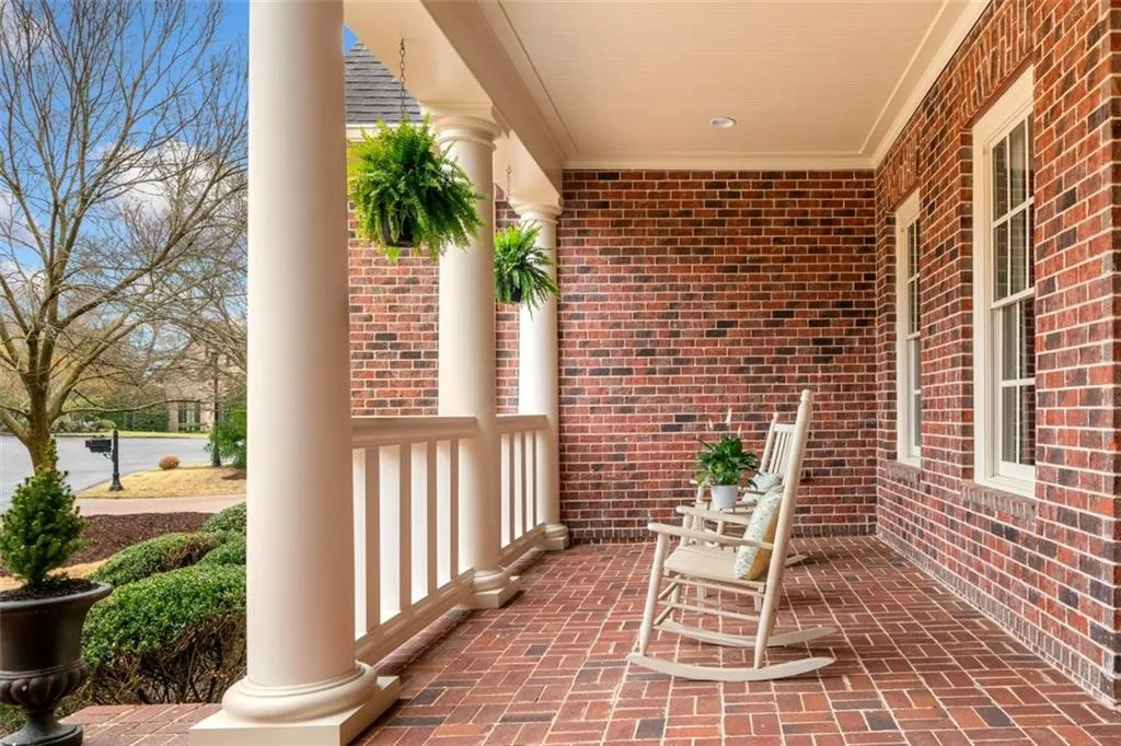 Outdoor Living Begins at the Front Door with a Large Covered Veranda