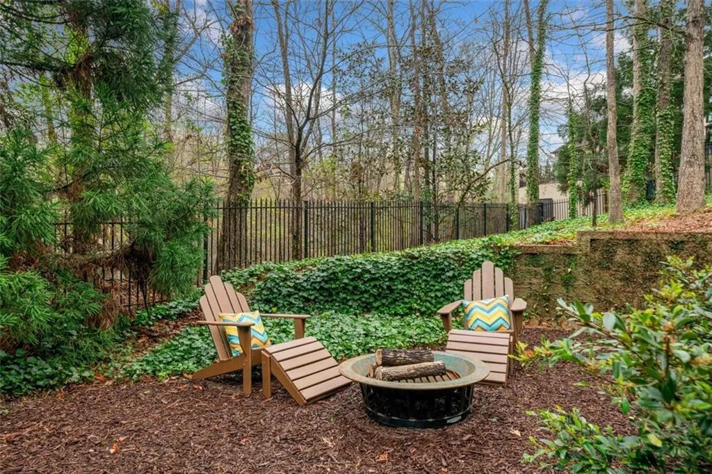 Side yard off of Terrace Level. Beautiful Hardscape around Property