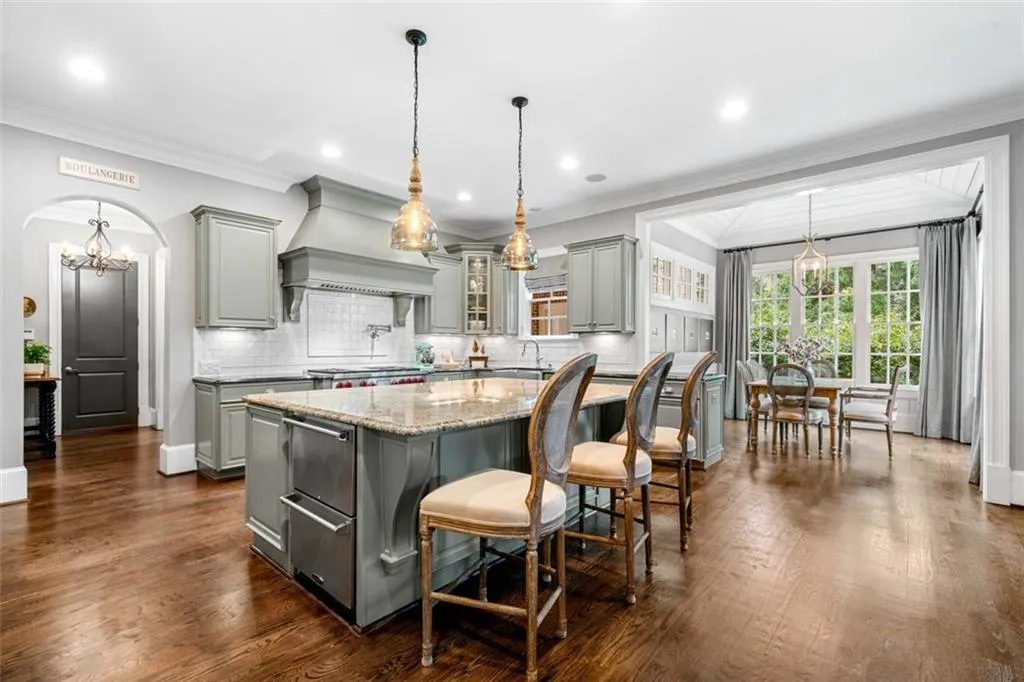 Large Center Island with Marvel Double-Door Cooler and Light-filled Breakfast Room