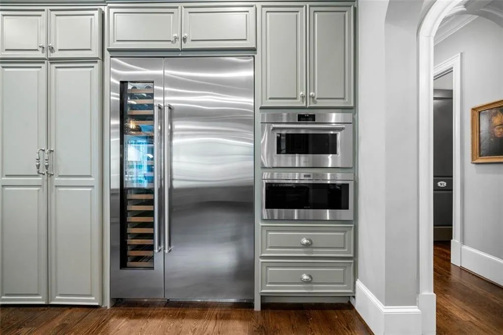 Hidden Walk-In Pantry, SubZero Fridge with Wine Column, Steam Oven, and Drawer Microwave
