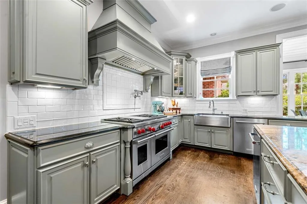 Wolf Gas Range, Two Dishwashers, Farmhouse Sink, Underlit Custom Cabinets
