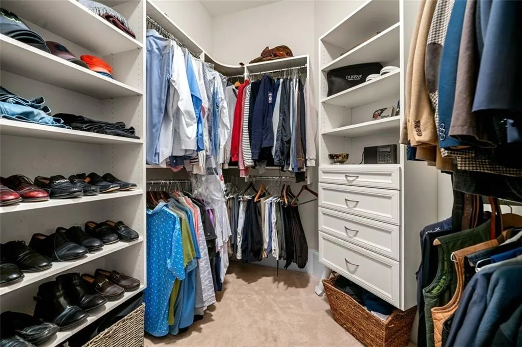 One of Two Custom Walk-in Closets in Primary Suite