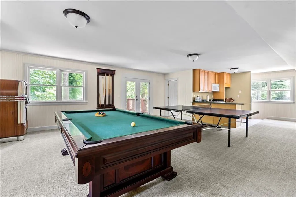 Large Recreation room above garage.