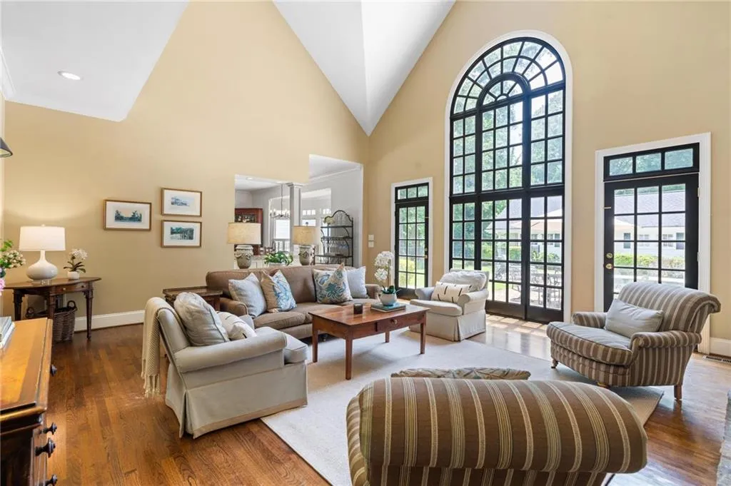 Family room has french doors leading to the back yard and pool,