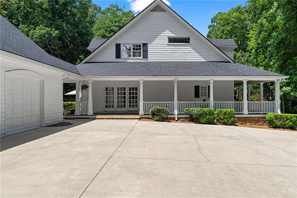 The french doors ahead lead into the kitchen,