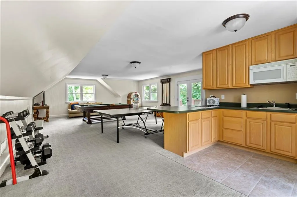 Kitchen in recreation room above garage.