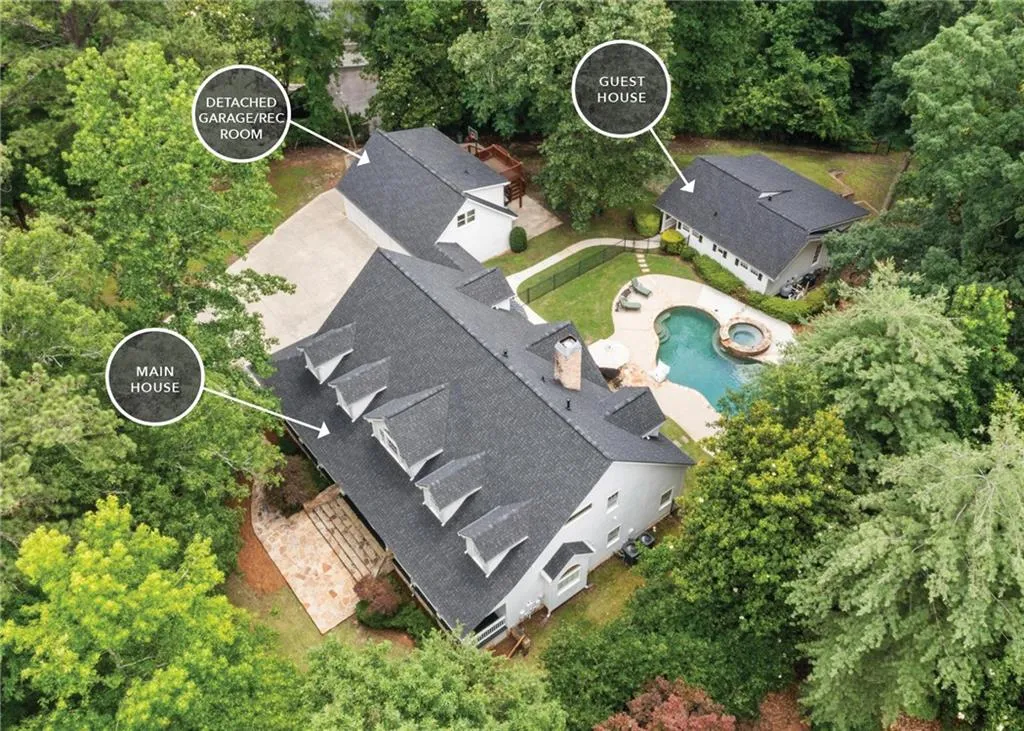 Just under 1.2 acre estate in Buckhead with main house, 2/1 guest house with kitchen and a 3-car detached garage with bonus space above, including a full bath and kitchen.