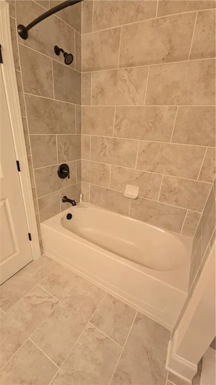 Bathroom with bathing tub / shower combination