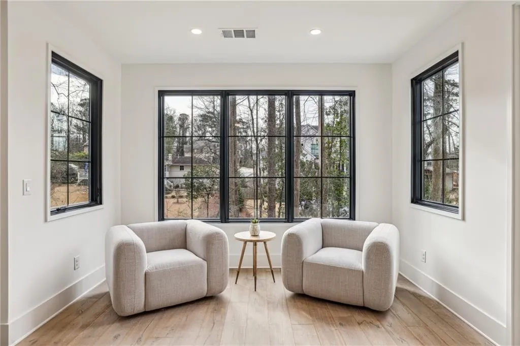 Living area with light wood-type flooring