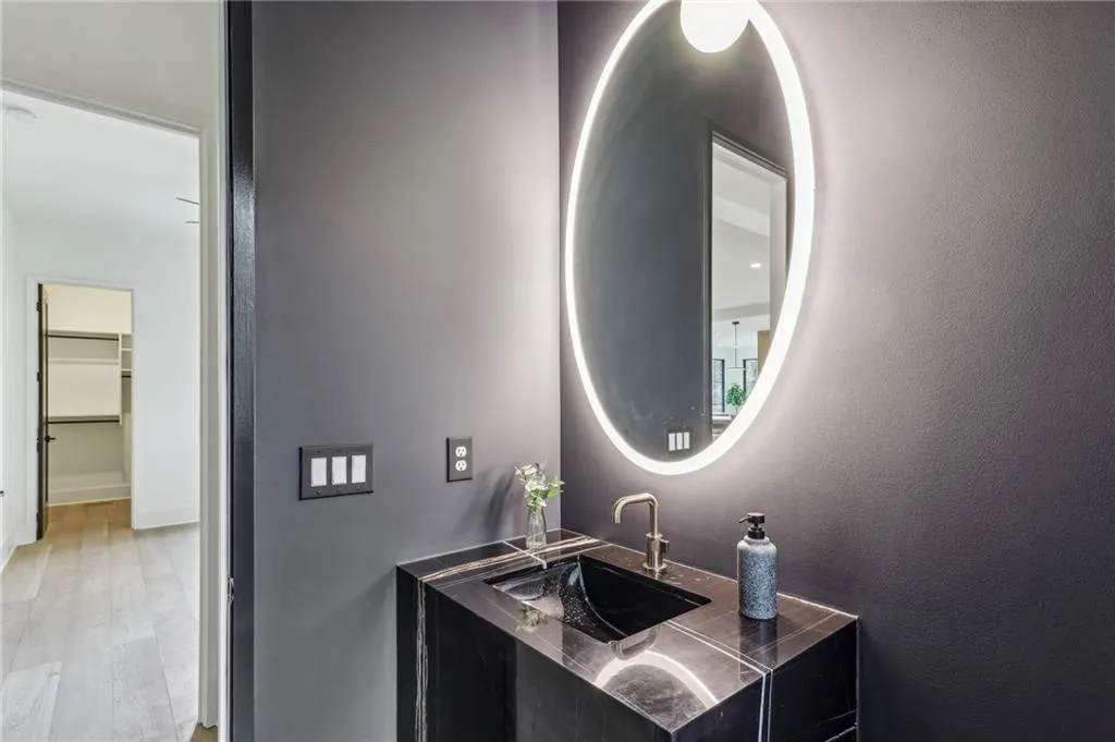 Bathroom with wood-type flooring and vanity