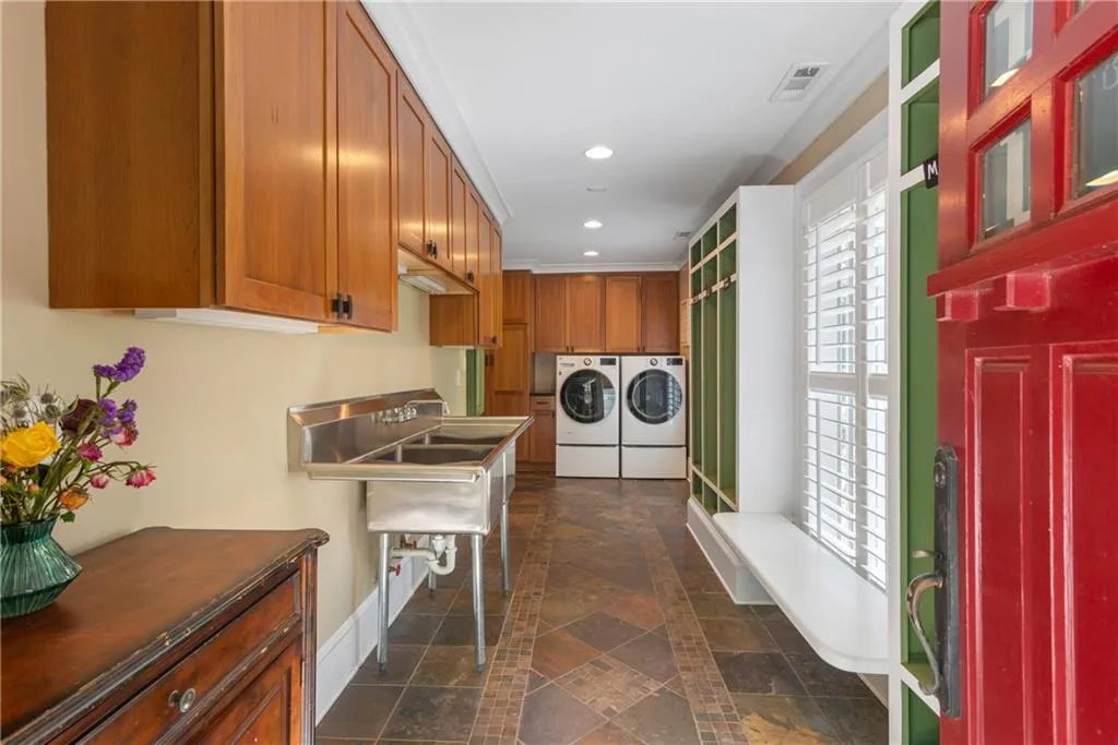Laundry / Mudd Room with Cubbie Lockers & Double Utility Sink