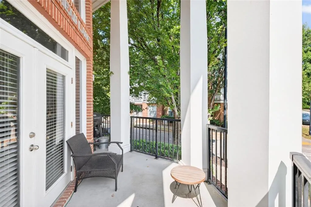 Balcony featuring area for grilling