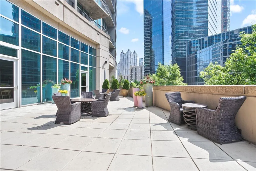 View of patio / terrace with a city view and outdoor dining space