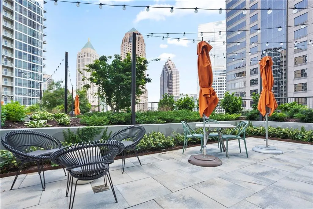 View of patio featuring a view of city and outdoor dining area