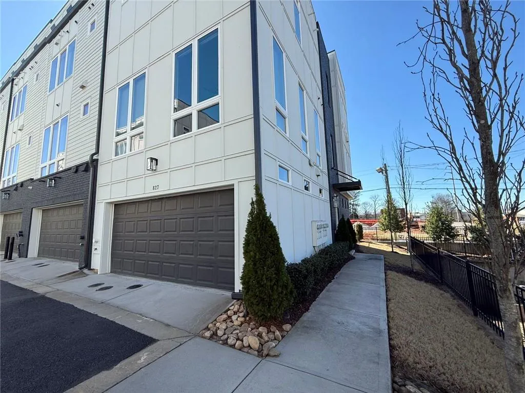 View of side of property with fence