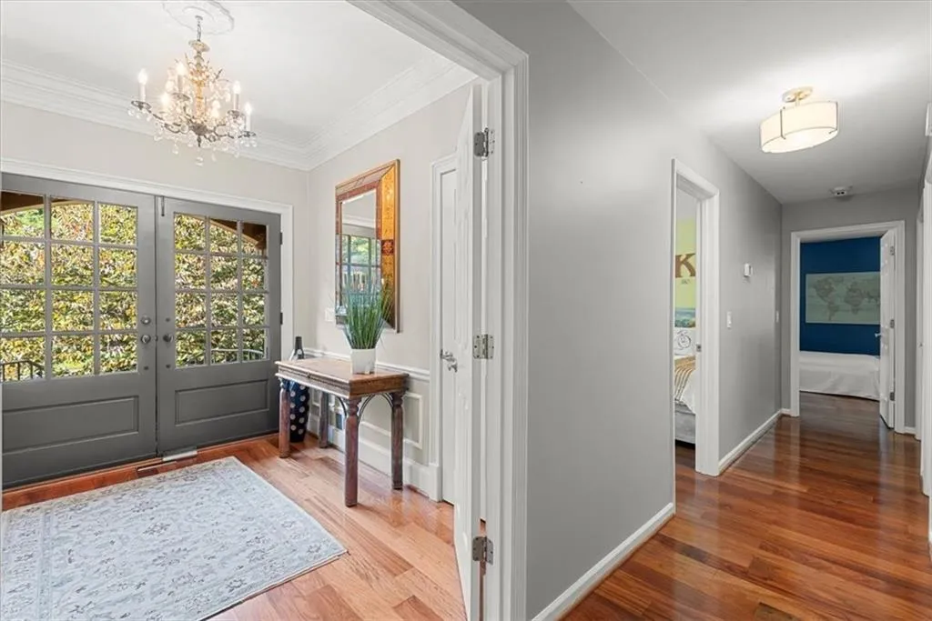 Hallway leading to bedrooms and shared bath