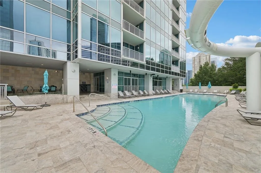 Community pool featuring a patio area