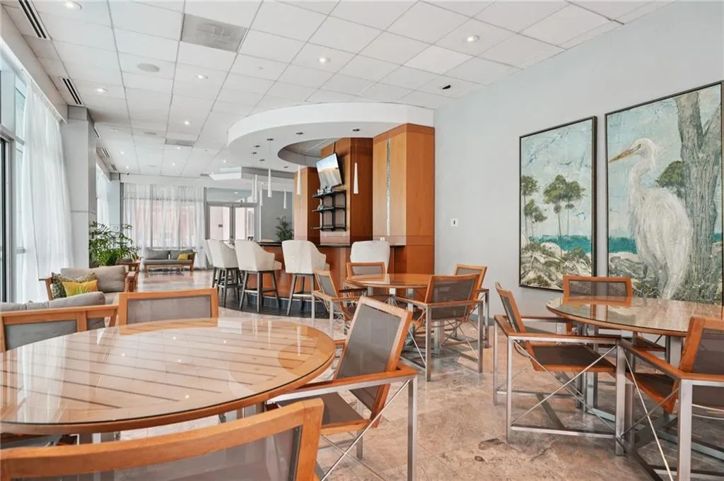 Dining area featuring recessed lighting and a paneled ceiling