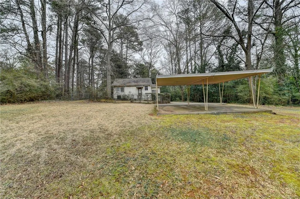 View of yard and carport