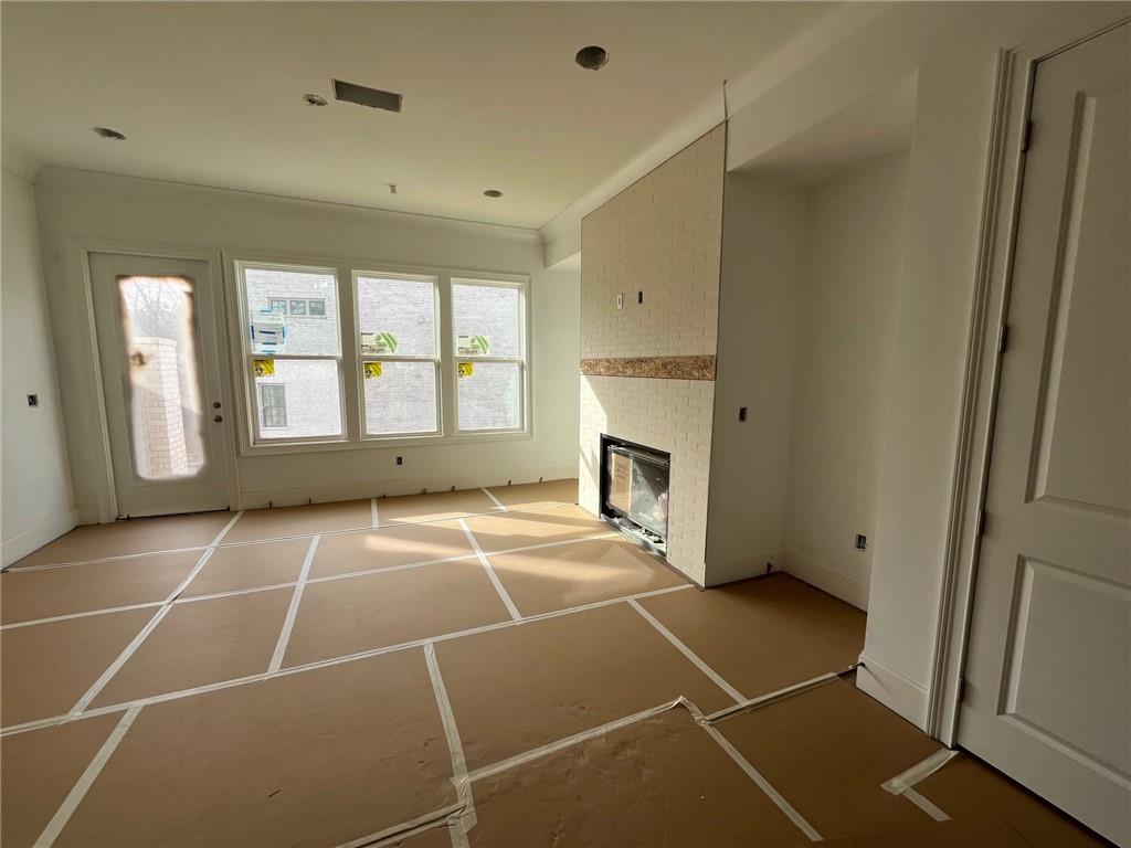 The family room offers hardwood flooring with cove molding!