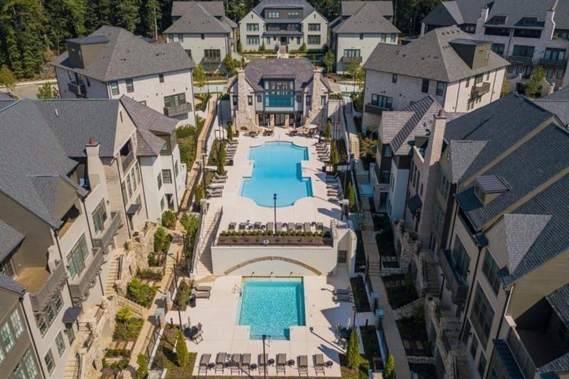 View of the 2 pools in Aria North nestled between the townhomes.