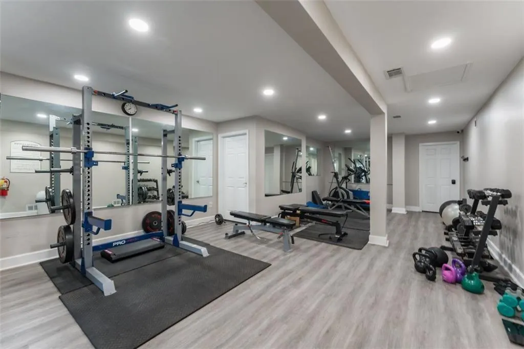 Gym featuring numerous workout machines