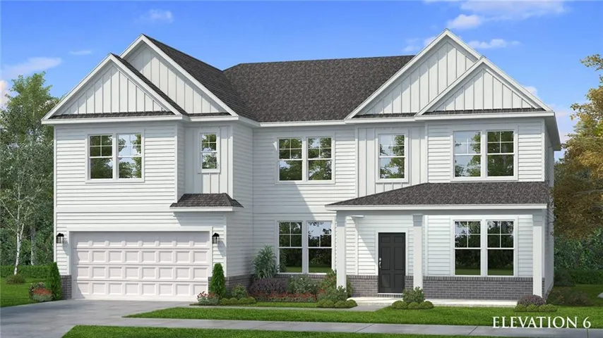 Two-story exterior with white siding and board-and-batten accents