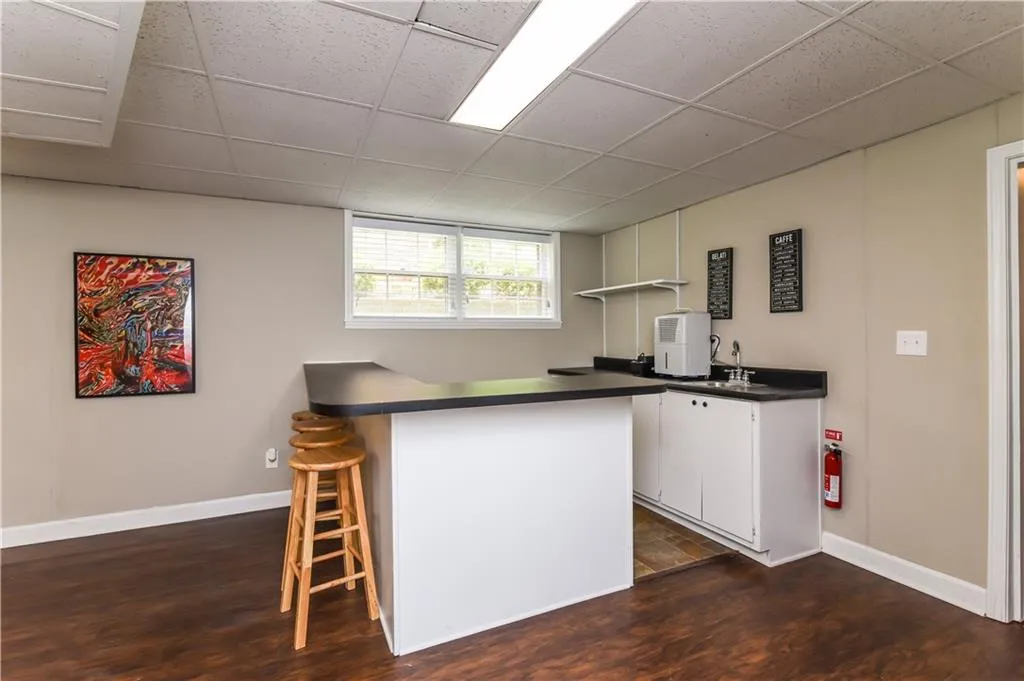 215 W Spalding Drive, Atlanta, Georgia 30328, 4 Bedrooms Bedrooms, ,3 BathroomsBathrooms,Residential,Sold,215 W Spalding Drive,6045529