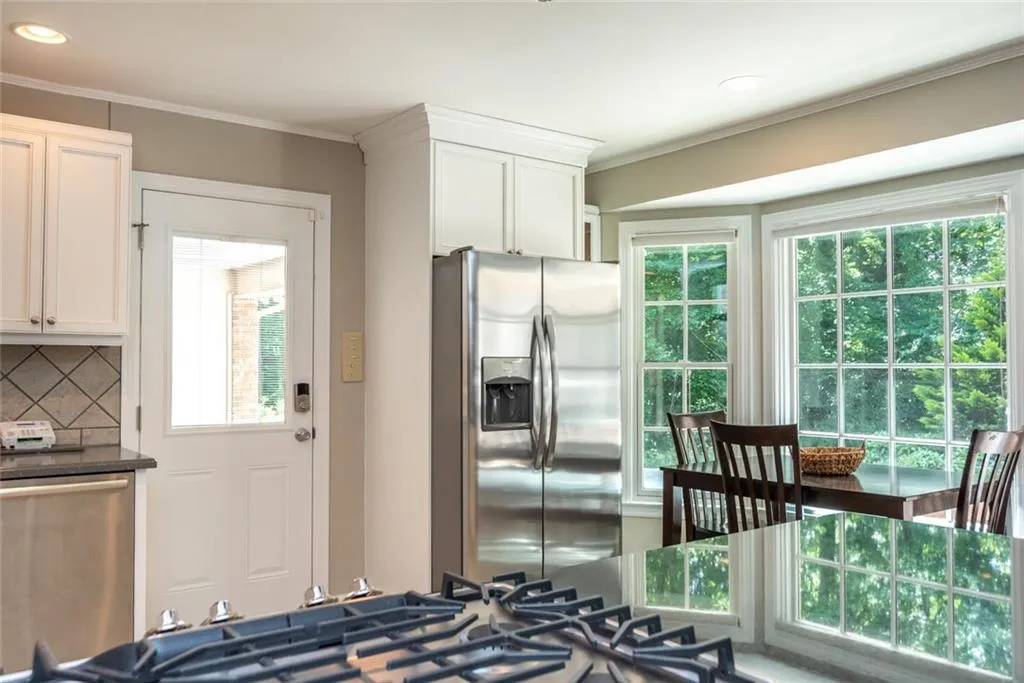 215 W Spalding Drive, Atlanta, Georgia 30328, 4 Bedrooms Bedrooms, ,3 BathroomsBathrooms,Residential,Sold,215 W Spalding Drive,6045529