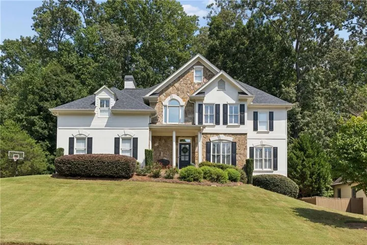 Stucco and stone exterior.