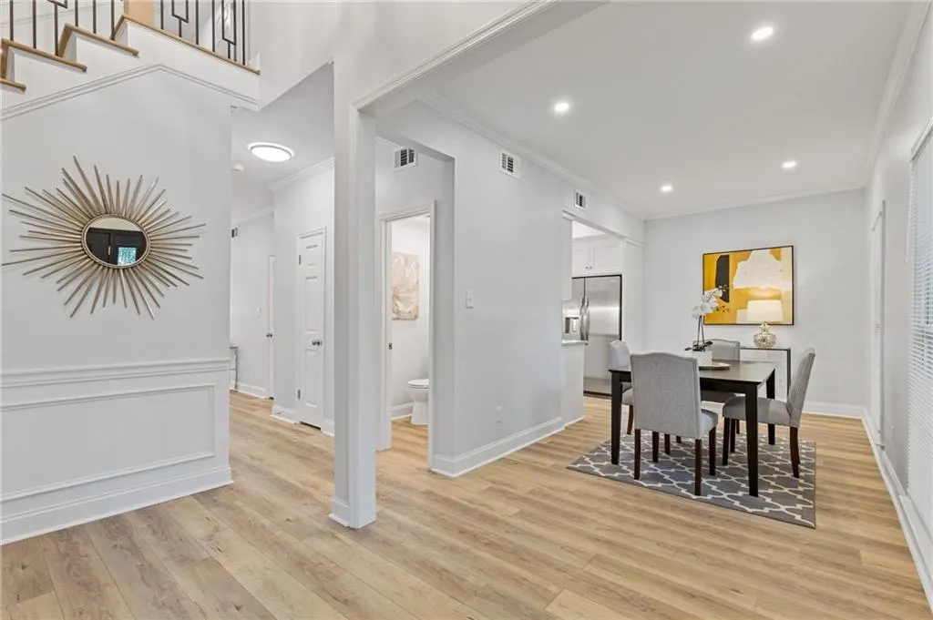 Bright open foyer; open view to kitchen gathering space