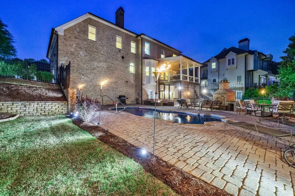 twilight shot of the back of the house