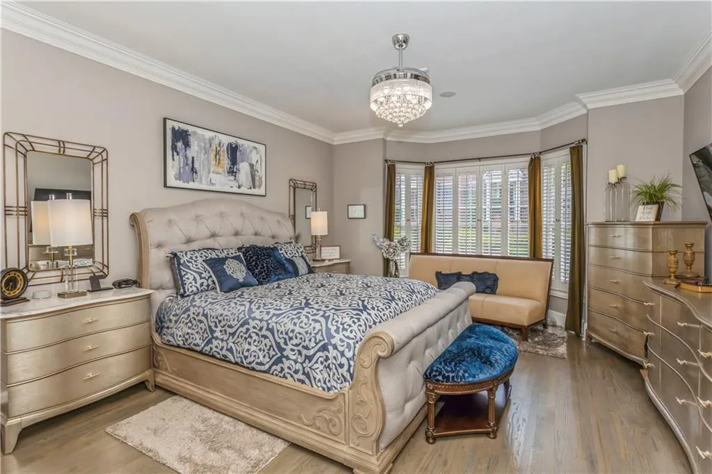 Primary bedroom is larger than it looks and has a beautiful bay window with plenty of space for a siting area.