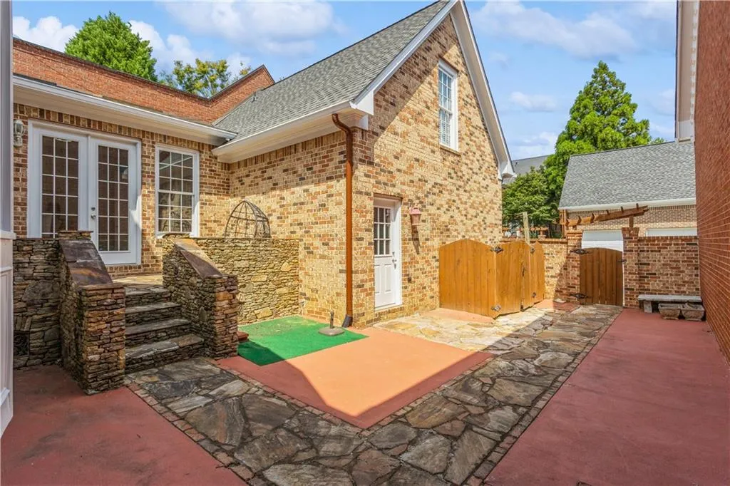 View of patio / terrace featuring a gate and french doors