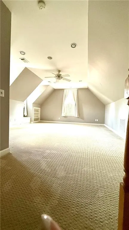 Huge ensuite with vaulted ceiling above the two-car garage.