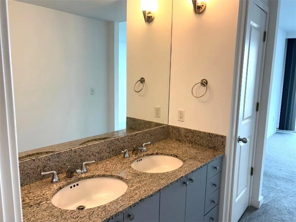 Bathroom featuring double vanity