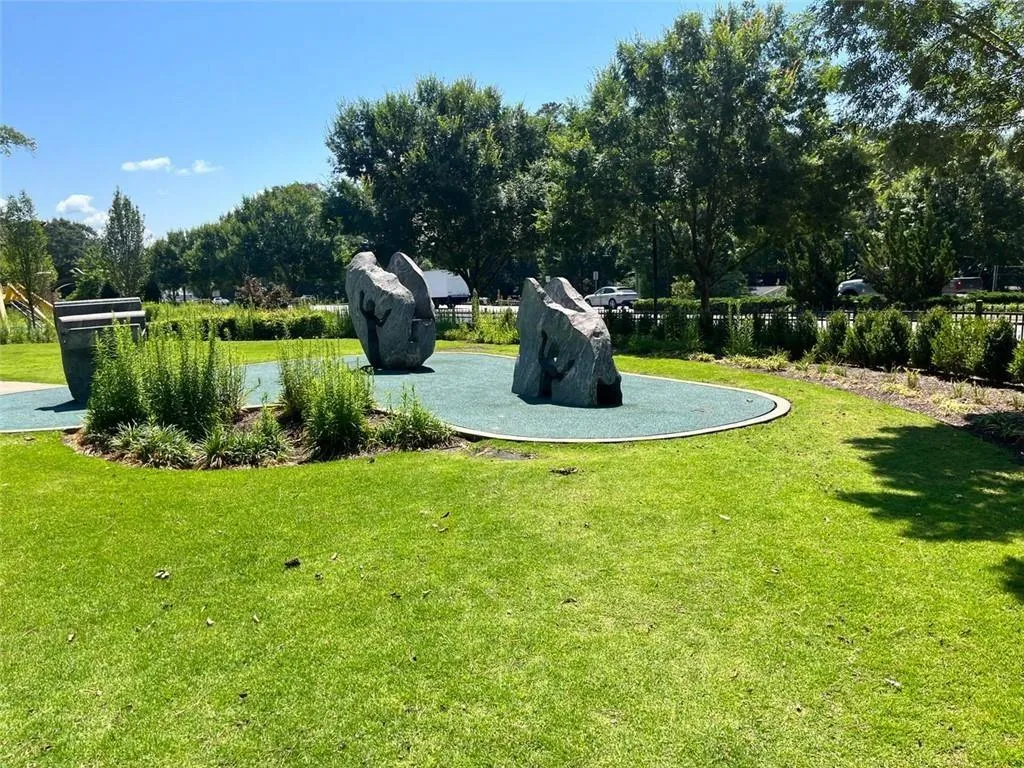 View of community with a yard