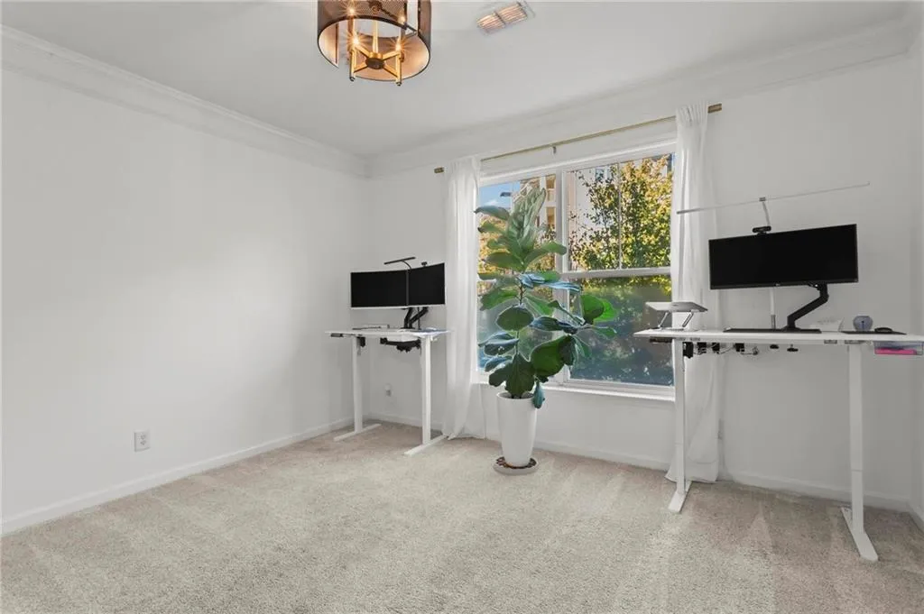 Secondary bedroom used as office space.